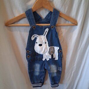 baby boy denim overalls featuring a puppy dog embroidery and "woof woof" text